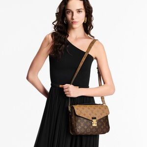 Louis Vuitton M44876 Reverse 
Pochette Métis $2,760.00 Monogram Canvas NWT box